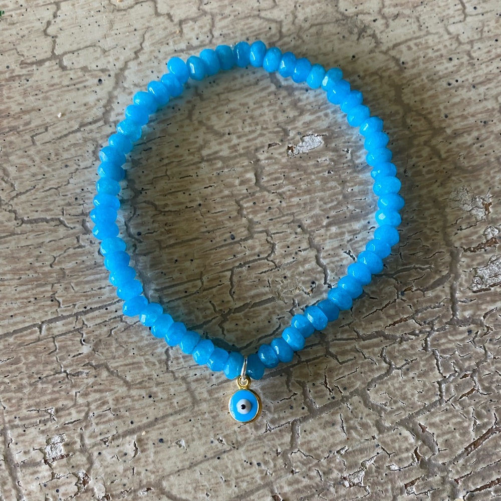 Genuine faceted blue jade crystal evil eye bracelet
